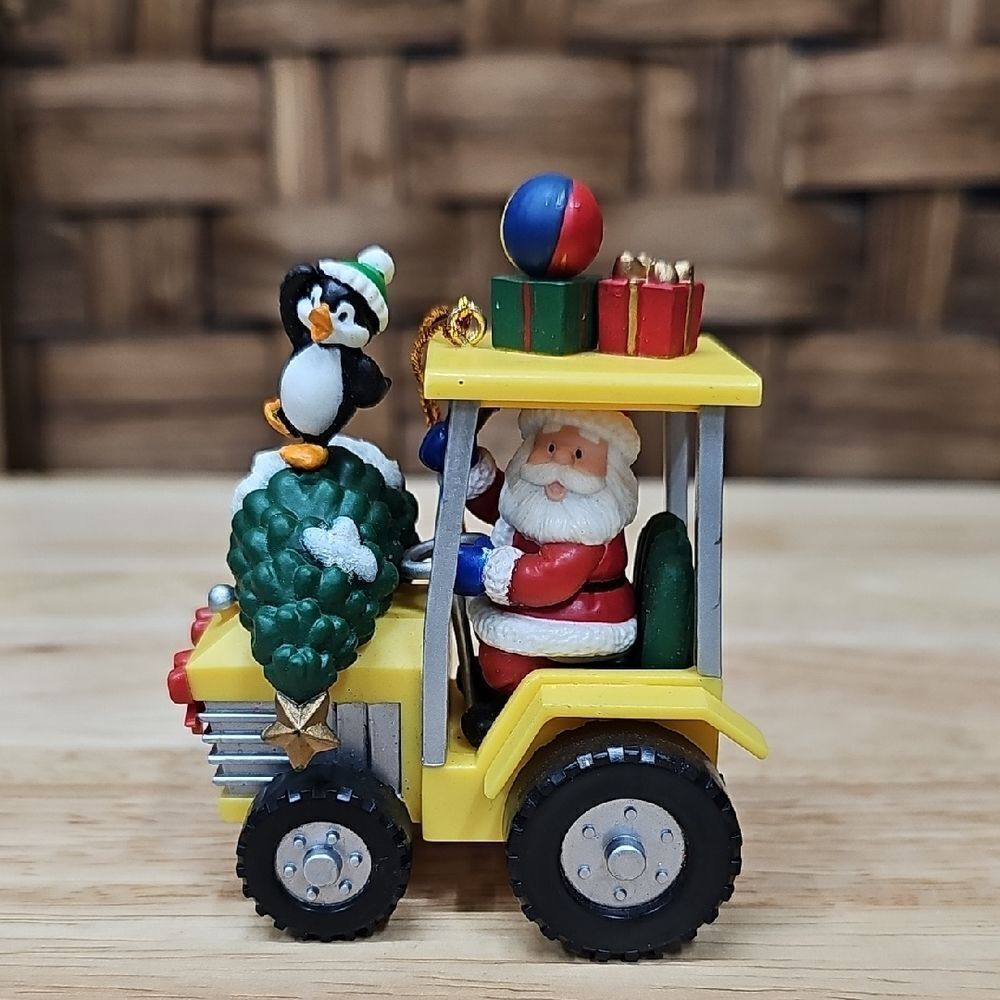 Santa's Christmas Festive Tractor Ornament with Penguin